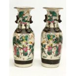 A pair of 19th century Chinese Nanjing pottery vases. 30cm