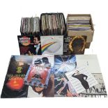 A large collection of vintage vinyl records and LPs including Michael Jackson, Kool & The Gang,