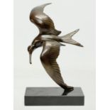 A bronze seagull on slate base. 17x28.5cm.