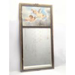 A large vintage ornate gilt framed mirror with hand painted panel. 69.5x134cm