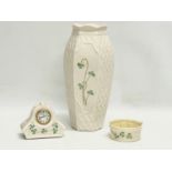 3 pieces of Belleek Pottery. Including a 3rd period butter bowl. Vase measures 26cm.