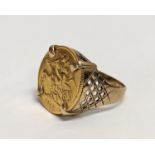 A 9ct gold ring with a Half Sovereign. 7.5g. Size UK R.