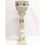 A vintage Italian pottery jardiniere on stand. 79cm