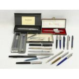 A collection of pens. 9 Parker. 4 Sheaffer etc