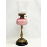 A tall Victorian double burner oil lamp. 61.5cm