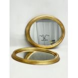 A pair of gilt framed mirrors. 36x30cm.