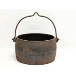 A Victorian cast iron pot. 37x38cm