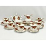 A 20 piece Royal Albert Old Country Roses tea set.