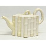 A 1st Period Belleek Pottery Bamboo teapot. 21x12.5cm