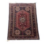 A good quality vintage Middle Eastern hand knotted rug. 103x162cm