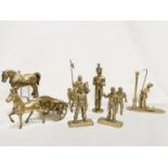 A quantity of large heavy brass ornaments. Horse and cart measures 33cm. Knight on horse measures
