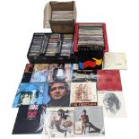 A collection of vintage vinyl records and LPs, with a collection of CDs. Including Michael