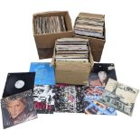 A large collection of vintage vinyl records and LPs
