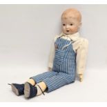 A late 19th / early 20th century Simon & Halbig bisque doll, Germany. 37cm