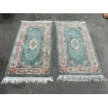 A pair of Chinese wool rugs