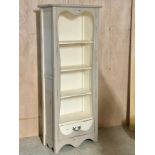 A French style painted bookcase.