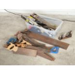 A quantity of vintage saws and other tools.