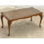 A vintage Burr Walnut coffee table with glass top.