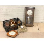 A 1930’s oak wall clock and other clock parts