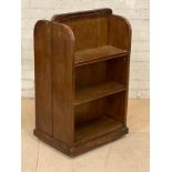 A vintage double sided open bookcase on wheels. 47x36x79cm