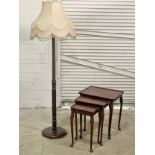 A vintage nest of tables and standard lamp