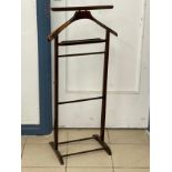 A vintage valet stand