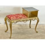 An ornate gilt telephone table. 79x36x61cm