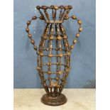 A large wooden candleholder. 49x84cm