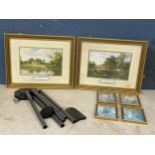 A quantity of gilt framed prints and a wind chime.