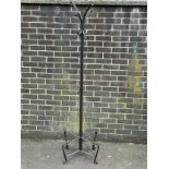 A metal hat and coat stand.