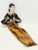 An early 20th century Javanese rod puppet. 59cm.