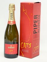 A bottle of Piper Heidsieck ‘Cats’ champagne in box. 750ml.