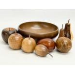 A set of good quality carved wooden fruit in bowl. Including Laburnum, Walnut, Padauk, Chestnut,