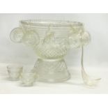 A large vintage 2 piece cut glass punch bowl and 17 matching cups. 35x33cm