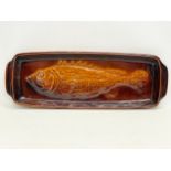 A large French pottery fish platter. By St Clement. 2755. 66x24cm