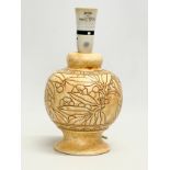 A 1920’s Charlotte Rhead pottery table lamp. Designed for Bursley Ware. 14x27cm