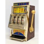 A vintage tabletop Waco Casino Seven Slot Machine. 23x33cm