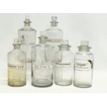 6 late 19th/early 20th century chemist bottles. Largest 10x23cm. Smallest 20cm