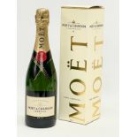 A bottle of Moët & Chandon Imperial Brut champagne in box. 150th Anniversary. 750ml.