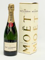 A bottle of Moët & Chandon Imperial Brut champagne in box. 150th Anniversary. 750ml.