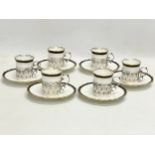 A 12 piece sterling silver Aynsley coffee set. Early 20th century. 1905-1925.