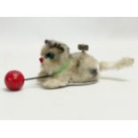 A vintage windup cat with ball. Japan. 18cm
