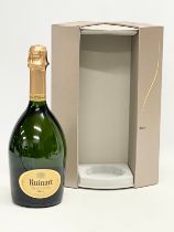 A bottle of Ruinart Brut Champagne in box. 750ml.