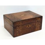 A Victorian inlaid Tunbridge Ware box. 27x20x12.5cm