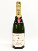 A vintage bottle of Moet & Chandon Champagne Epernay France Premiere Cuvee.
