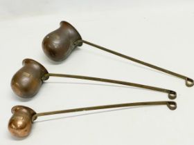 3 early 20th century copper measures. Whisky, Rum and Brandy. 37cm