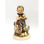 A Goebel pottery figure, "Feeding Time." 14cm