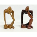 A pair of carved wooden ‘Thinking Man’ figures. Rosewood and elm. 15cm