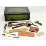 A collection of vintage miscellaneous. Including pipes, knives, cheroot etc.