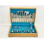 A vintage Monogram canteen of cutlery. 40x31x9cm